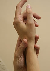 Hand holding a wrist